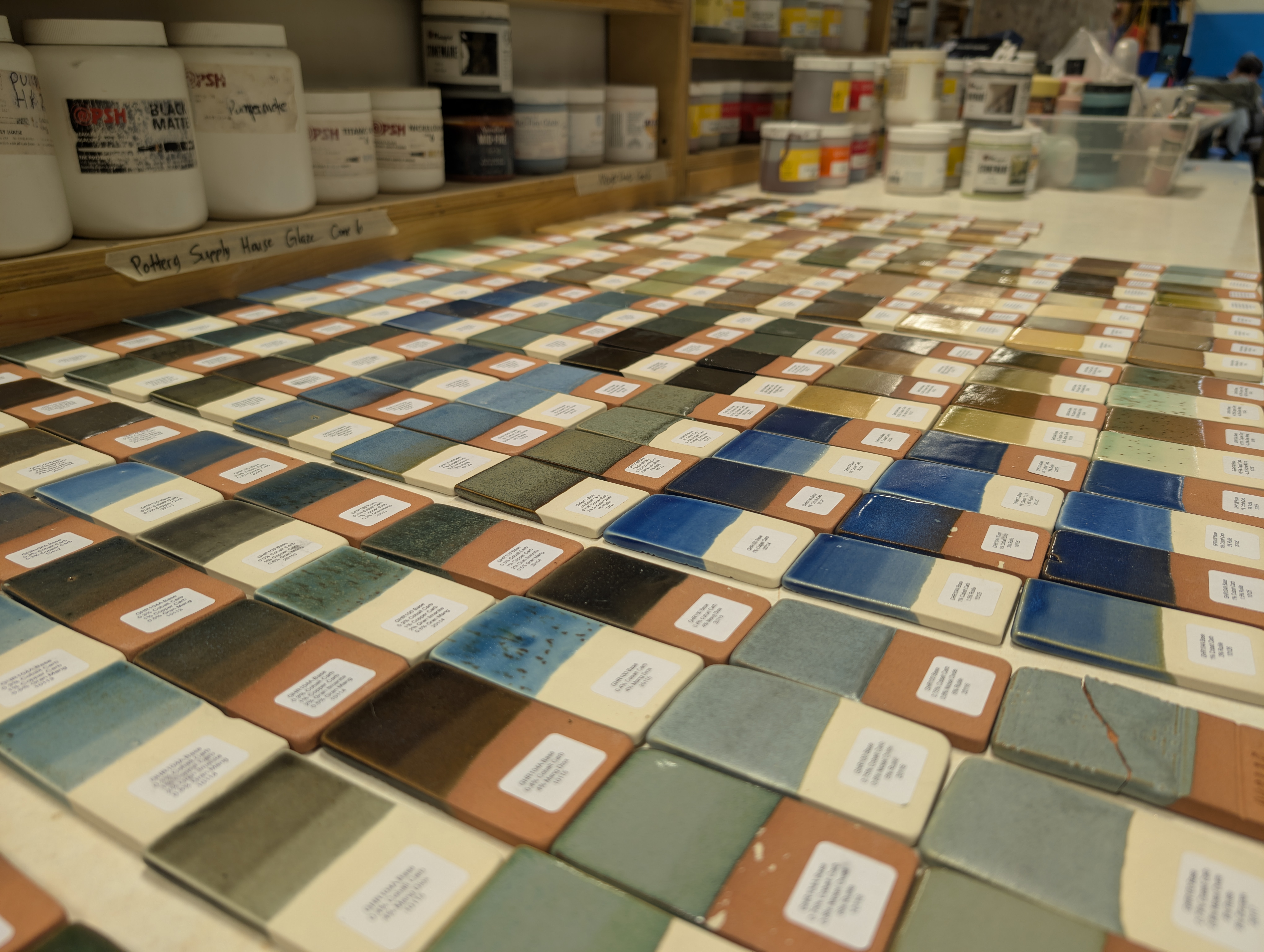 ents pottery glazes on shelves